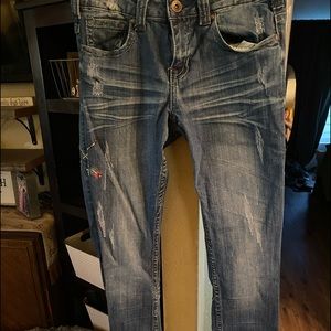 Cowgirl Tuff fly free and brave jeans